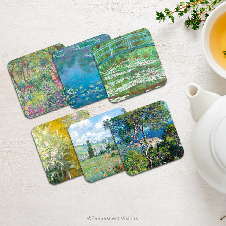 Monet art coasters on a table with a pot of tea