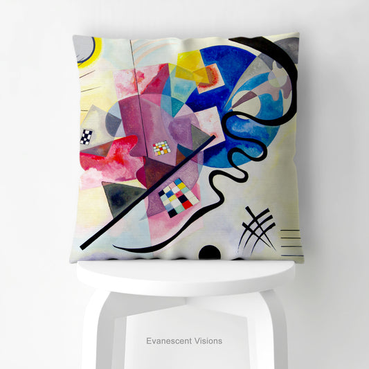 A square cushion with abstract geometric painting 'Jaune Rouge Bleu' By Kandinsky, on a white stool.