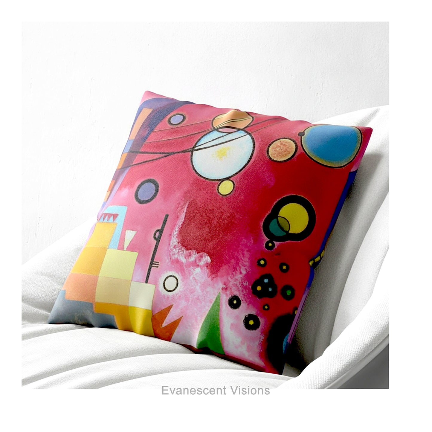 A colourful square cushion featuring an abstract art print of Schweres Rot (Heavy Red) by abstract artist Wassily Kandinsky, shown on a white armchair.