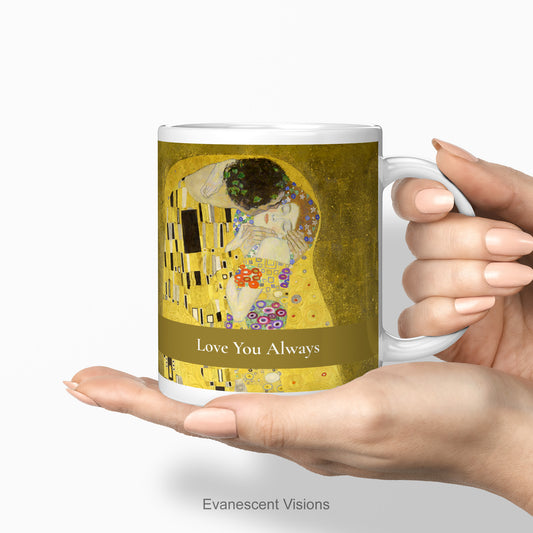 Personalised mug with Gustav Klimt's The Kiss. The mug is held with two hands.
