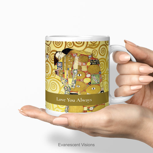 Personalised mug with Gustav Klimt's Fulfilment also known as The Embrace.  It is being held in two hands.