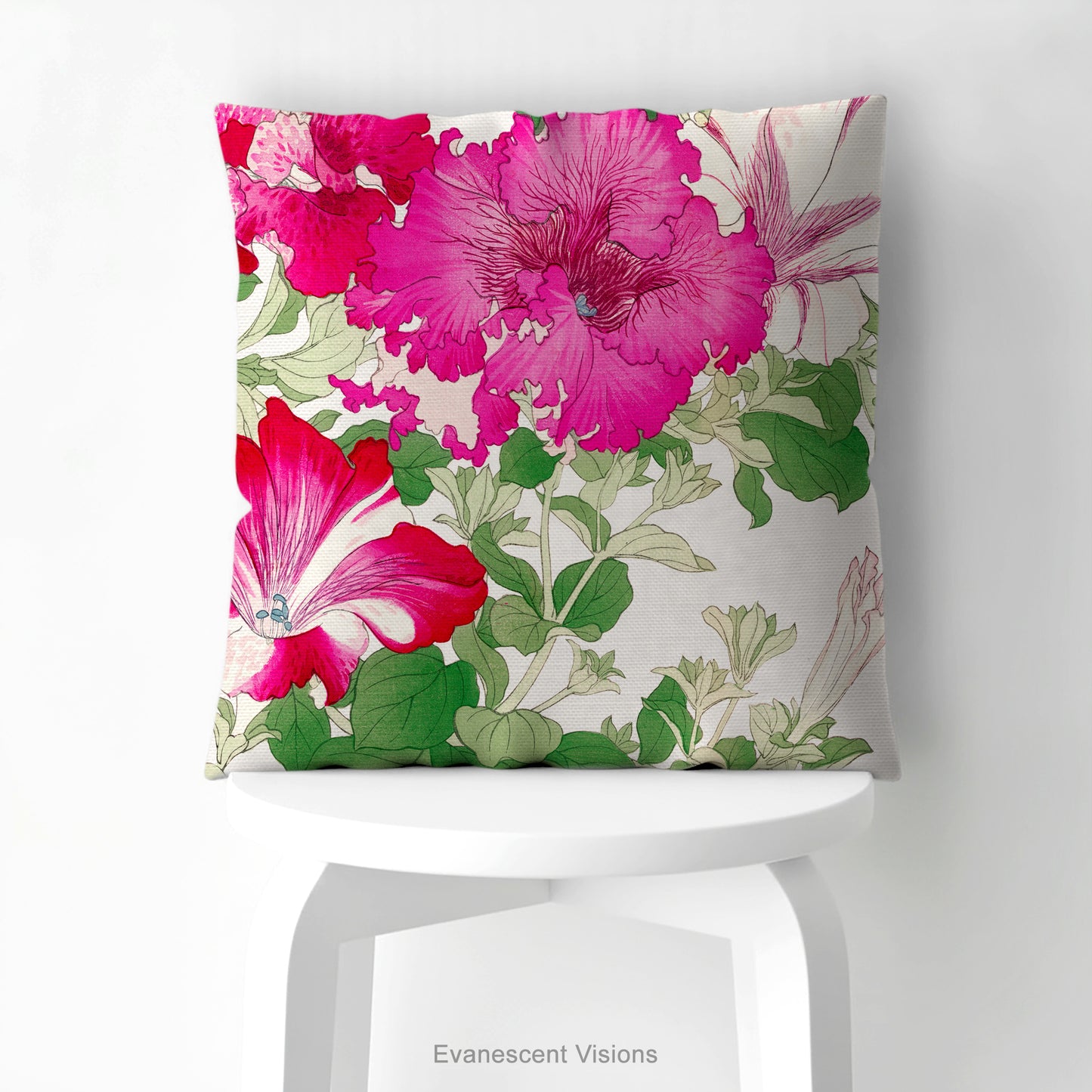 A square pillow with a vibrant floral print of Vintage petunia flowers by artist Tanigami Kônan, shown on a white stool.