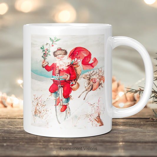 Santa Christmas Mug, with a vintage painting of Santa on a Penny Farthing bycicle.