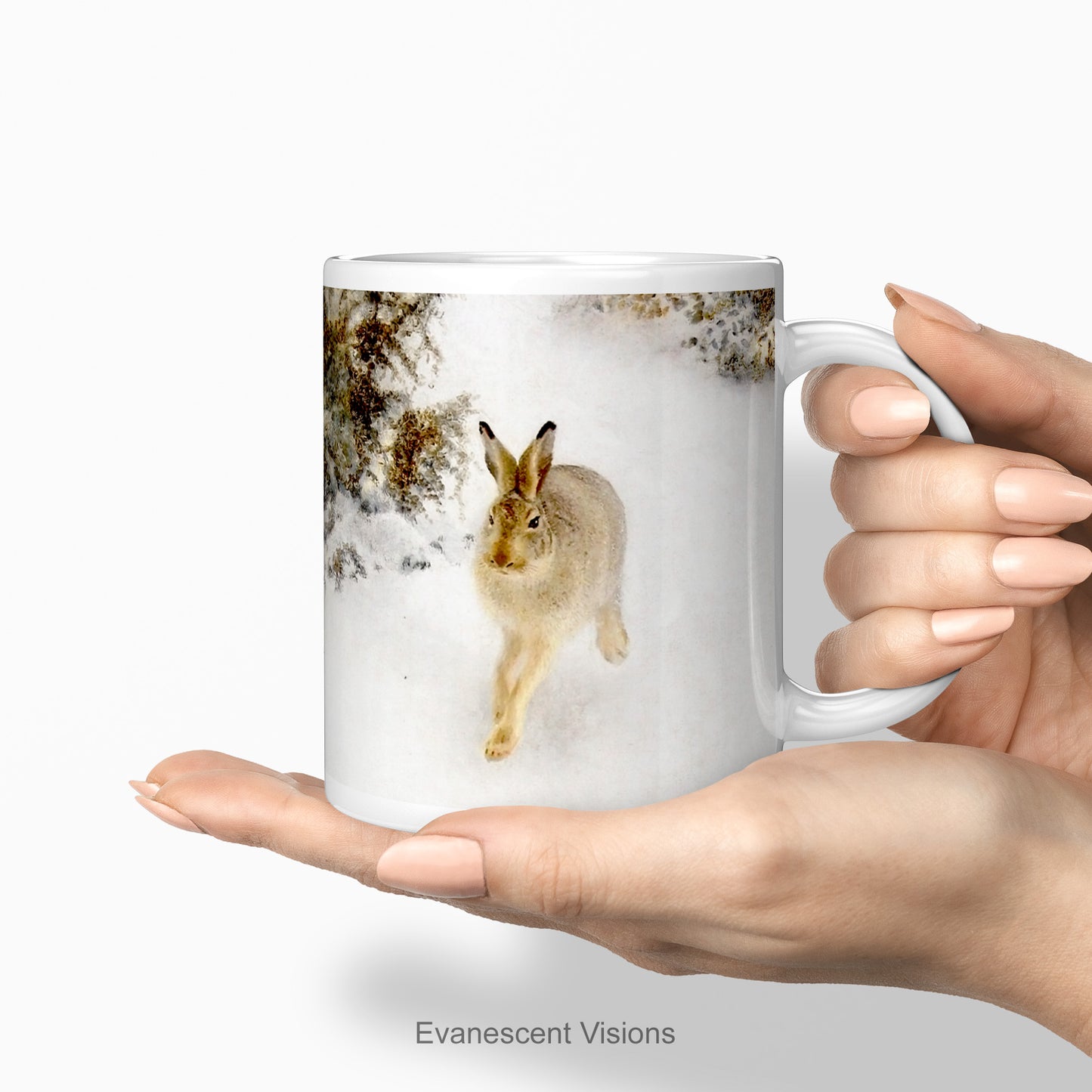 hands holding the Winter Hare Fine Art Christmas Mug