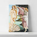 A hardcover featuring Sandro Botticelli's classic painting 'The Birth of Venus' displayed standing upright on a white shelf against a light gray wall. 