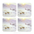 4 coasters with a print of the snowy winter landscape painting 'Southland Hills' by Joseph Farquharson, shown on a plain white background.  