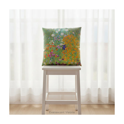 A colourful square cushion pillow featuring a floral design titled 'Bauerngarten' by Gustav Klimt, shown on a white stool against a curtained window. 