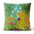 A square cushion pillow featuring a vibrant, impressionistic floral field design titled 'Bauerngarten' by Gustav Klimt, shown on a white chair.