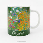 A white ceramic mug featuring  colorful floral painting Bauerngarten by Klimt, and personalised with a name. 