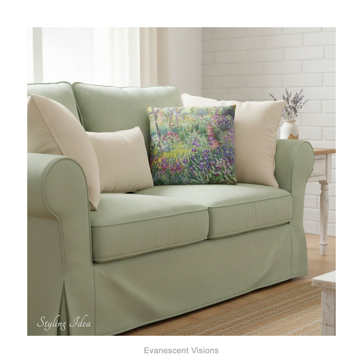A square decorative cushion featuring an impressionist floral artwork 'The Artist's Garden' by Claude Monet, on a pale green sofa. 