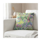 A square decorative cushion  featuring an impressionist floral artwork 'The Artist's Garden' by Claude Monet, on cream coloured sofa.