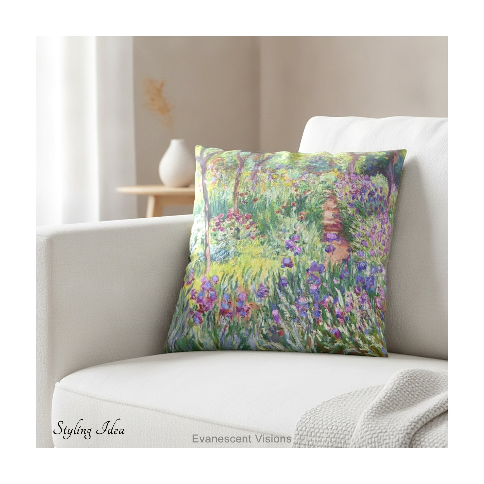 A square decorative cushion  featuring an impressionist floral artwork 'The Artist's Garden' by Claude Monet, on cream coloured sofa.