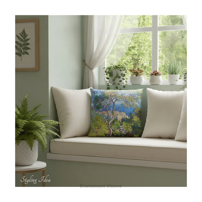 A square pillow printed with with Monet's Bordighera painting,  on a window seat in a room with green decor and plants.