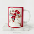 A ceramic Christmas Mug, with a vintage illustration of Santa Claus on a Penny Farthing bicycle. 