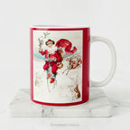 A ceramic Christmas Mug, with a vintage illustration of Santa Claus on a Penny Farthing bicycle. 