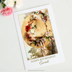 Greeting card with words 'Happy Retirement' and recipient name, featuring artwork' Straw Hat with Roses, Carnations, and Cornflowers' by artist Angelo Rossi. 