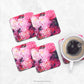 Pink Peonies Floral Coasters on a marble counter with a cup of coffee