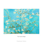 A hardback notebook open showing the full back view printed with the floral impressionistic painting 'Almond Blossom' by an Gogh.