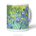 Front view of a white ceramic mug featuring a printed artwork of painting 'Irises' by Vincent Van Gogh, featuring blue irises against a textured yellow-green background, shown on a clean white studio background.