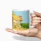 Ceramic mug with vintage design of Easter Chicks being held in female hands