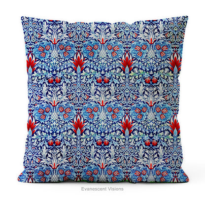 A square  cushion featuring  intricate William Morris pattern Snakeshead,  in blue, red, and white, 