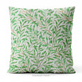 A square decorative cushion with green botanical pattern titled 'Willow Bough' by William Morris.