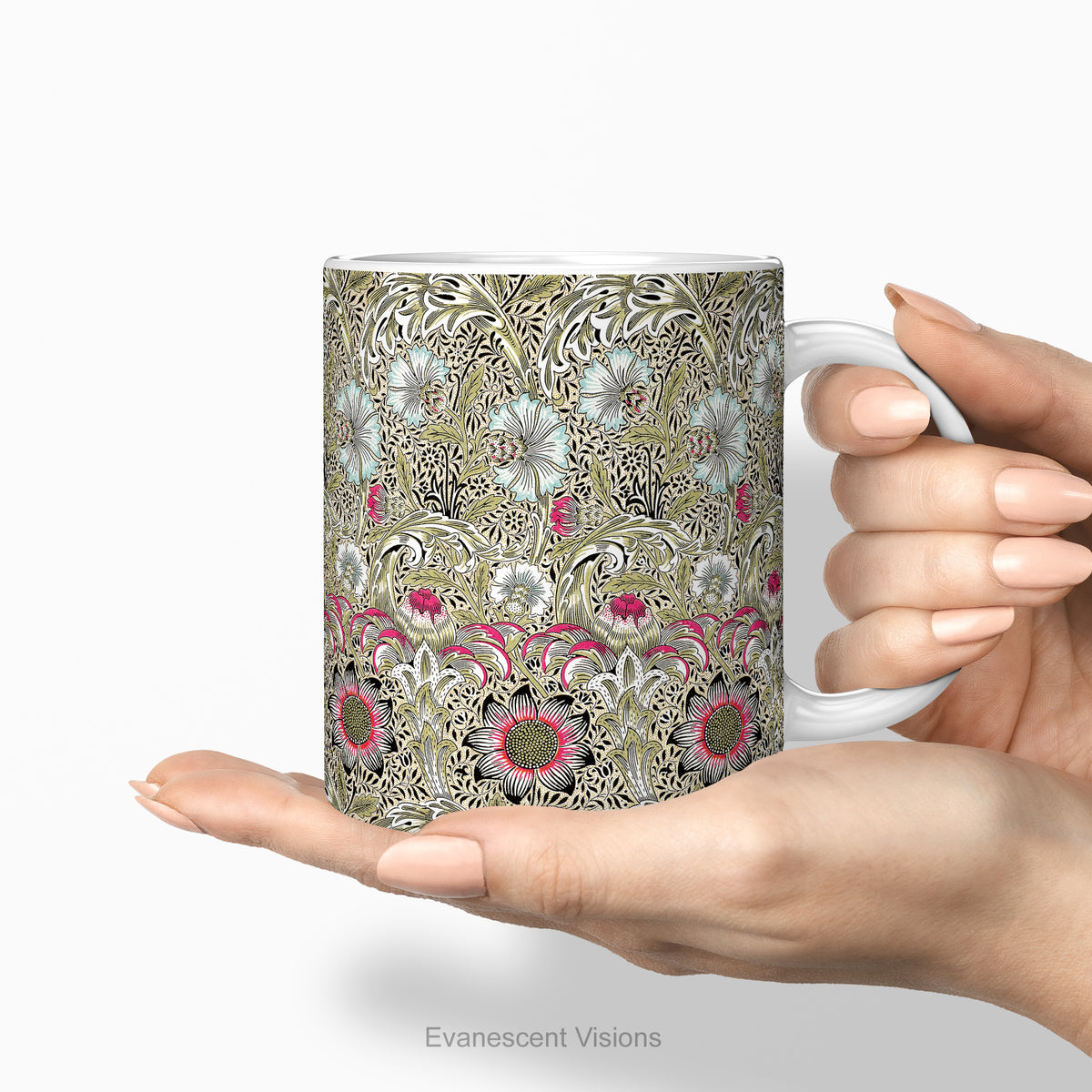 Hands holding a ceramic mug featuring print of floral design  'Corncockle' by William Morris.