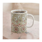 Corncockle floral mug styled on a pink marble counter. 