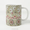 A  ceramic mug featuring print of floral design  'Corncockle' by William Morris.