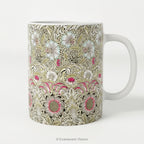 A  ceramic mug featuring print of floral design  'Corncockle' by William Morris.