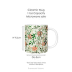 A ceramic mug featuring botanical pattern  'Jasmin'  by William Morris, with mug dimensions.