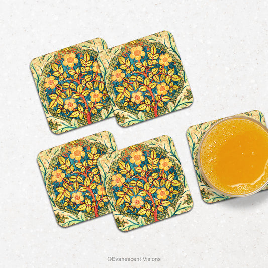 William Morris Rose Wreath Drinks Coasters on a  counter wtih a glass of orange juice.