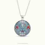 Pendant necklaces with detail from artwork  'Snakeshead' by William Morris