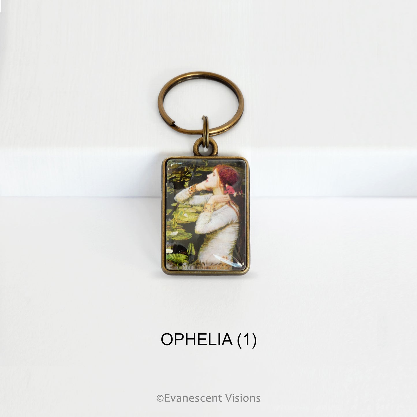 Pre-Raphaelite art keyring with artwork 'Ophelia' by John William Waterhouse, on a white background
