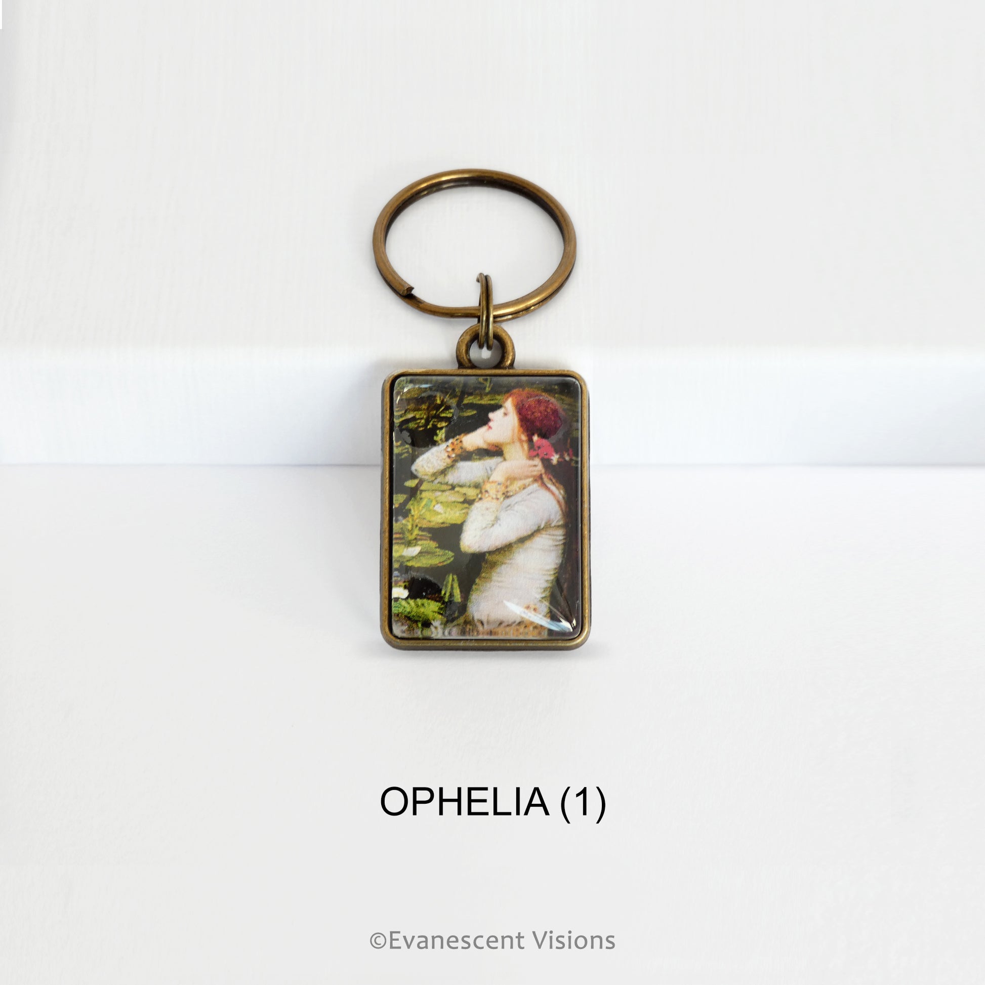Pre-Raphaelite art keyring with artwork 'Ophelia' by John William Waterhouse, on a white background