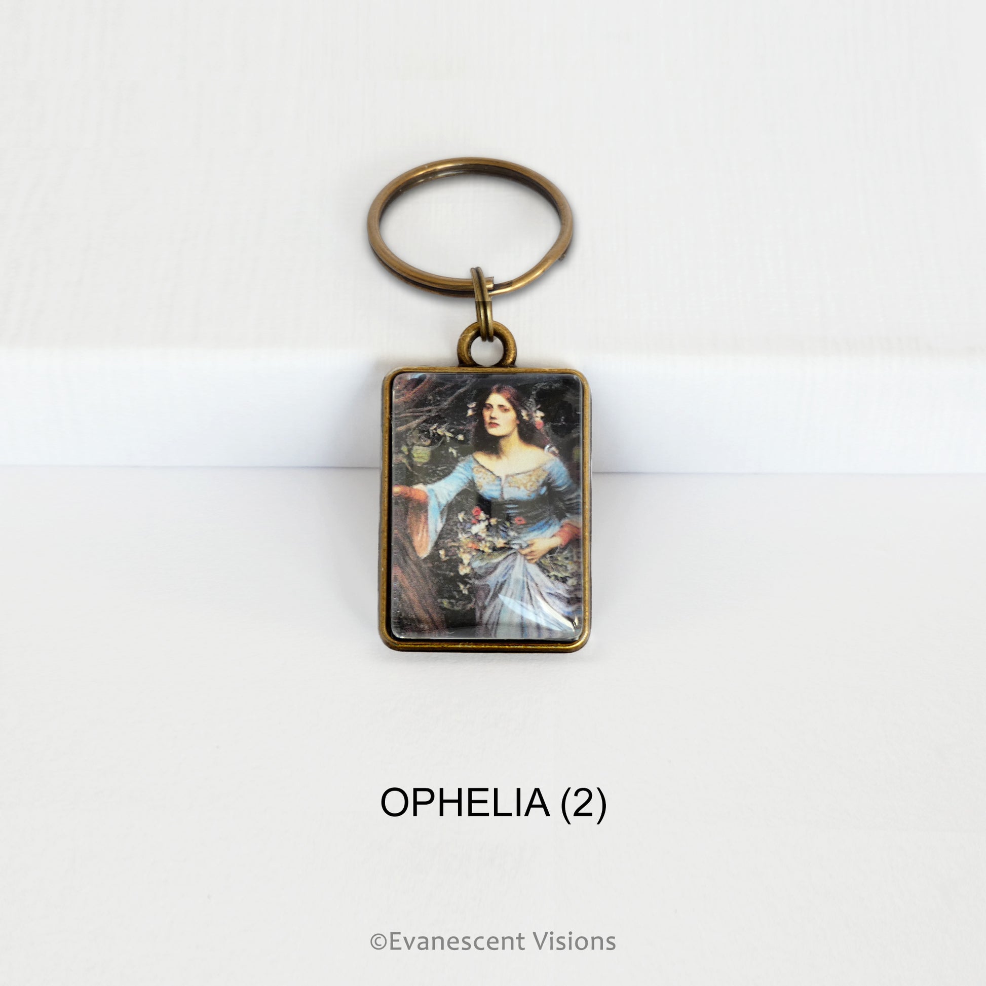 Pre-Raphaelite art keyring with artwork 'Ophelia' by John William Waterhouse, on a white background
