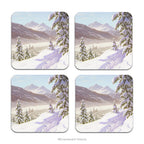 Set of 4 coasters decorated with a landscape of snowy mountains and snow-laden fir trees
