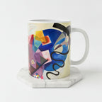 A white ceramic mug featuring an abstract geometric artwork 'Jaune Rouge Bleu' by Wassily Kandinsky.
