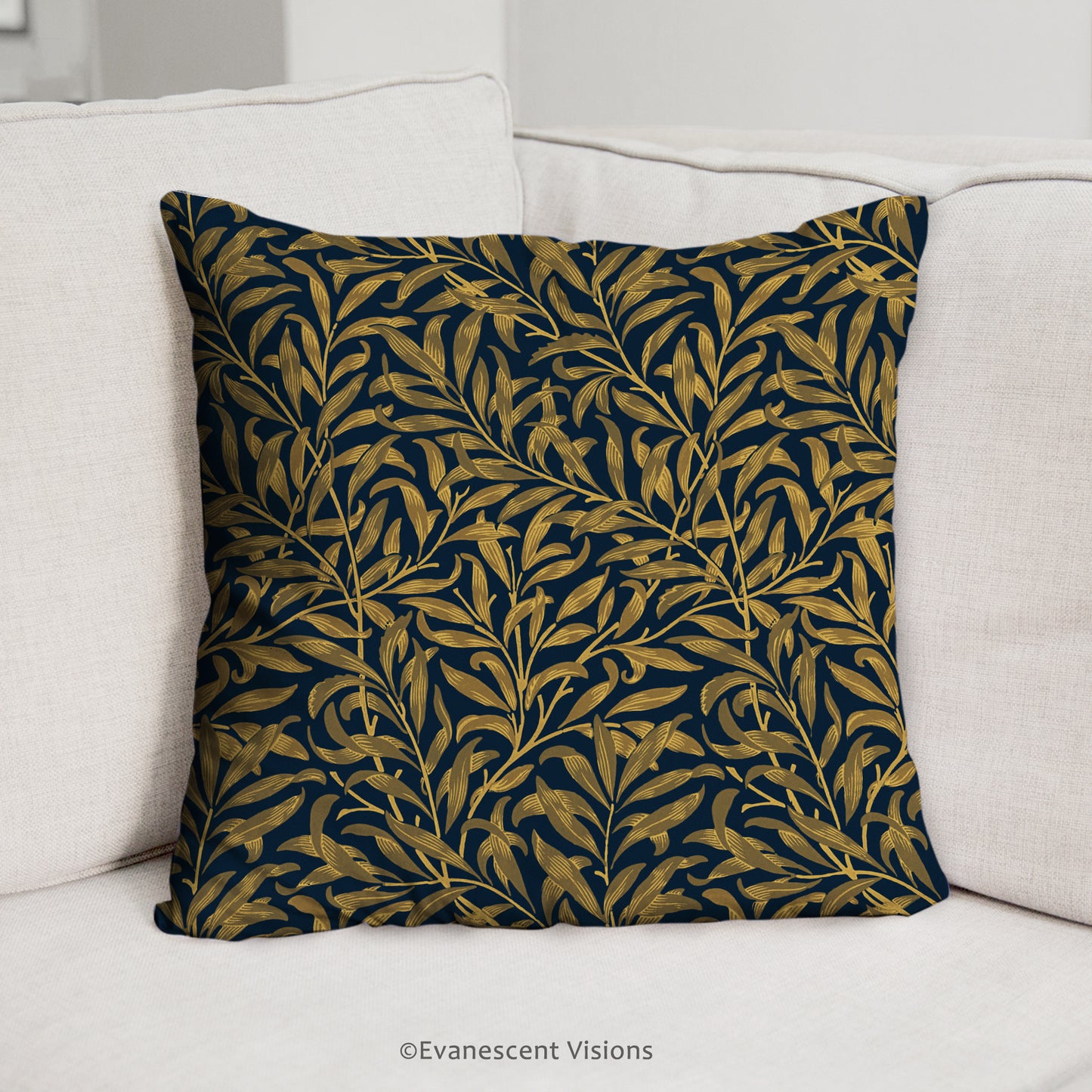 william morris willow bough cushion cover on a cushion shown on a couch