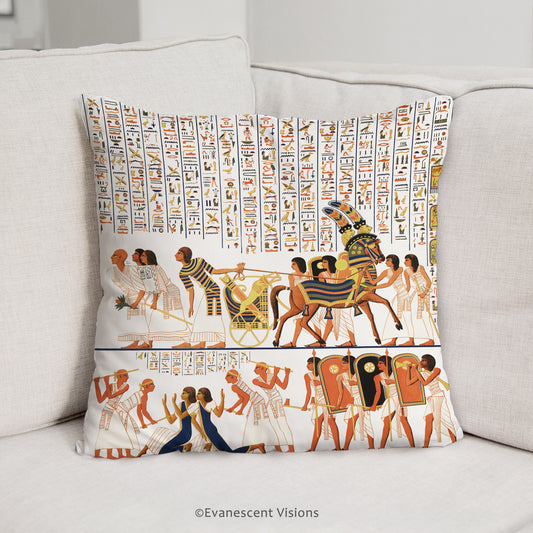 Image of the Ancient Egypt Scatter Cushion depicting people and hieroglyphs, placed on the corner of a sofa.