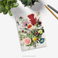 Floral wildflowers fine art notebook on a desk with plants and pens