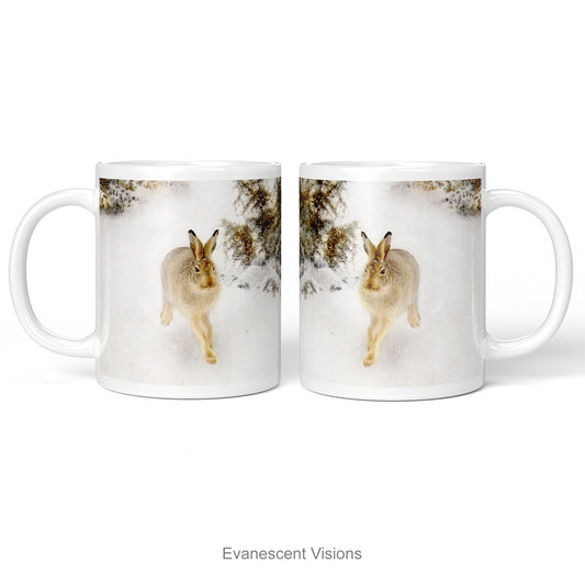 left and right views of the Winter Hare Fine Art Christmas Mug with Bruno Liljefors 'Winter Hare' artwork