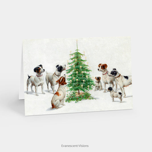 Puppies and Dogs around a Christmas Tree Fine Art Xmas Card standing on a table