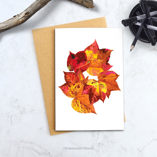 Evanescent visions Autumn Leaves Greeting Card on a desk